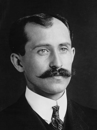 Orville Wright wearing a pennant mustache.