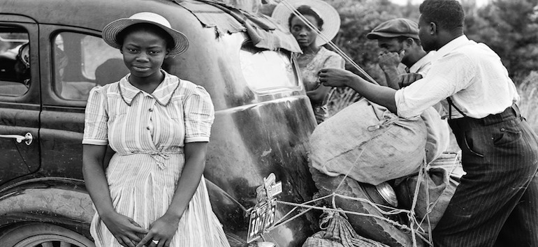 Vintage photo of an African American family and a vintage car