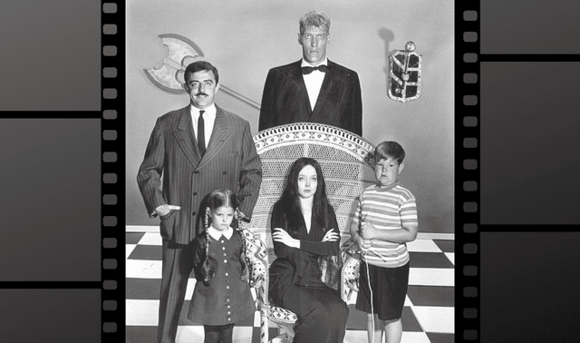 Addams family main cast in costume on a grey background.