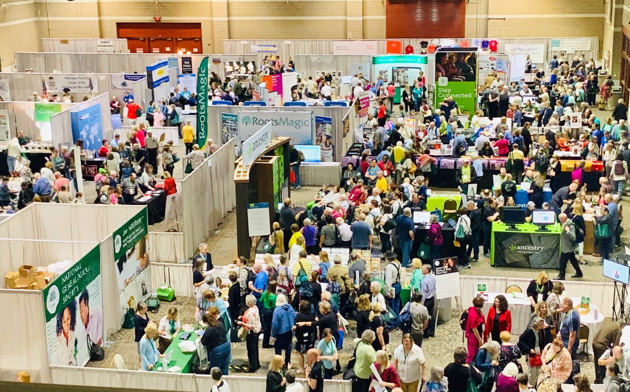 Overhead view of booths at a genealogy conference.