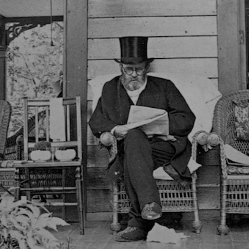 Ulysses S. Grant reading a newspaper.