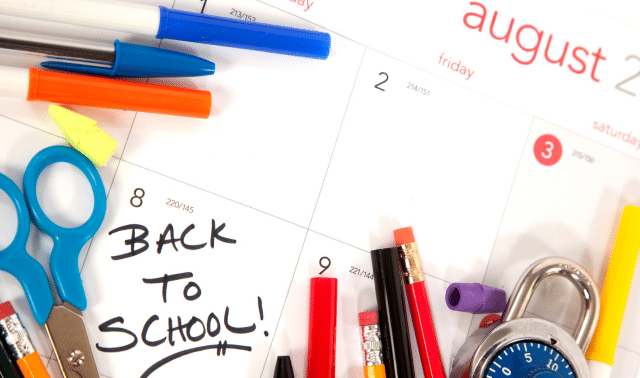 A calendar showing the month of August is surrounded by school supplies, including pens, pencils, scissors, and a padlock. The words "Back to School!" are written on a date in the calendar.