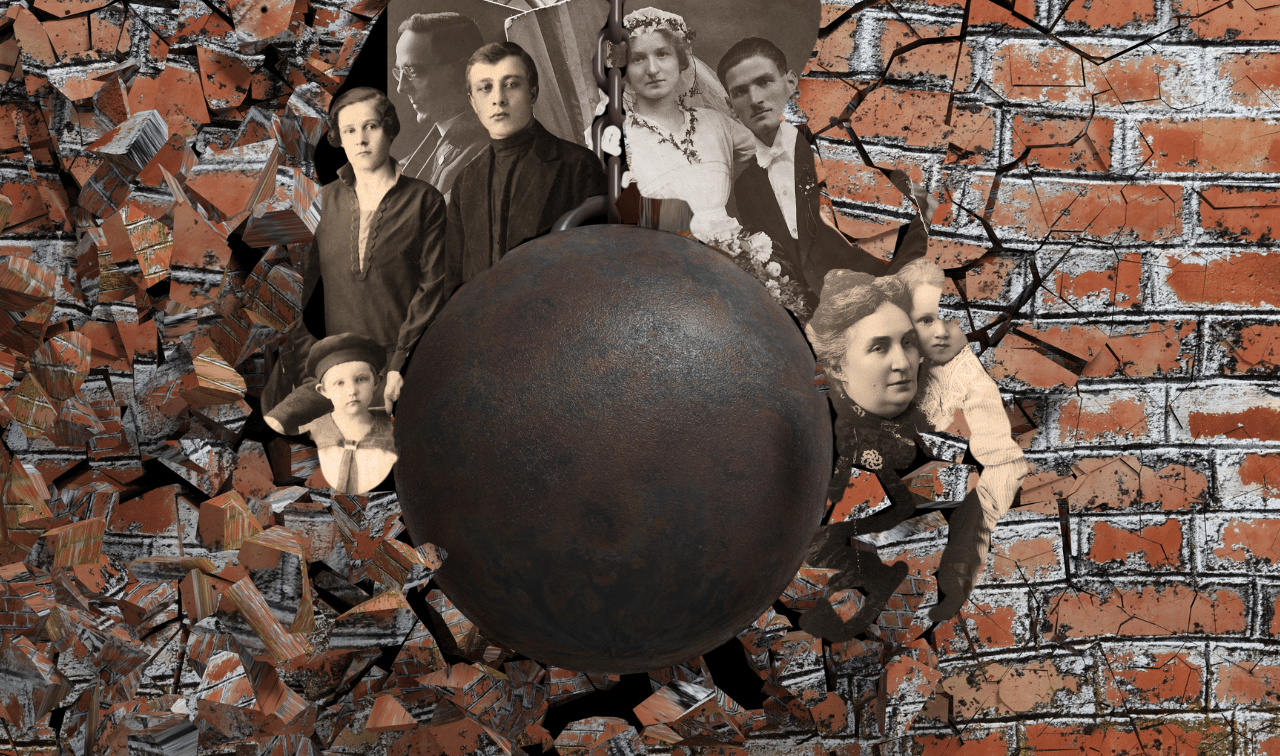 A wrecking ball breaks through a brick wall, revealing old black-and-white family portraits behind the debris.